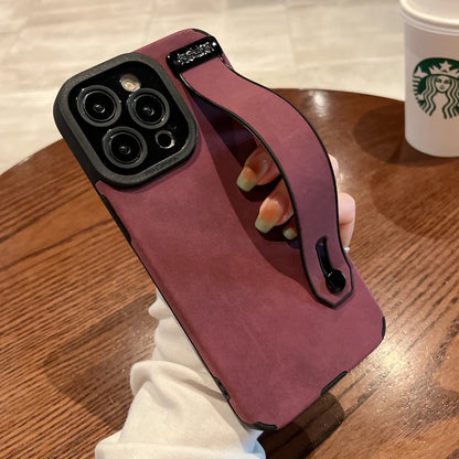Capa de Couro Premium com Alça de Pulso para iPhone — Proteção Elegante e Confortável